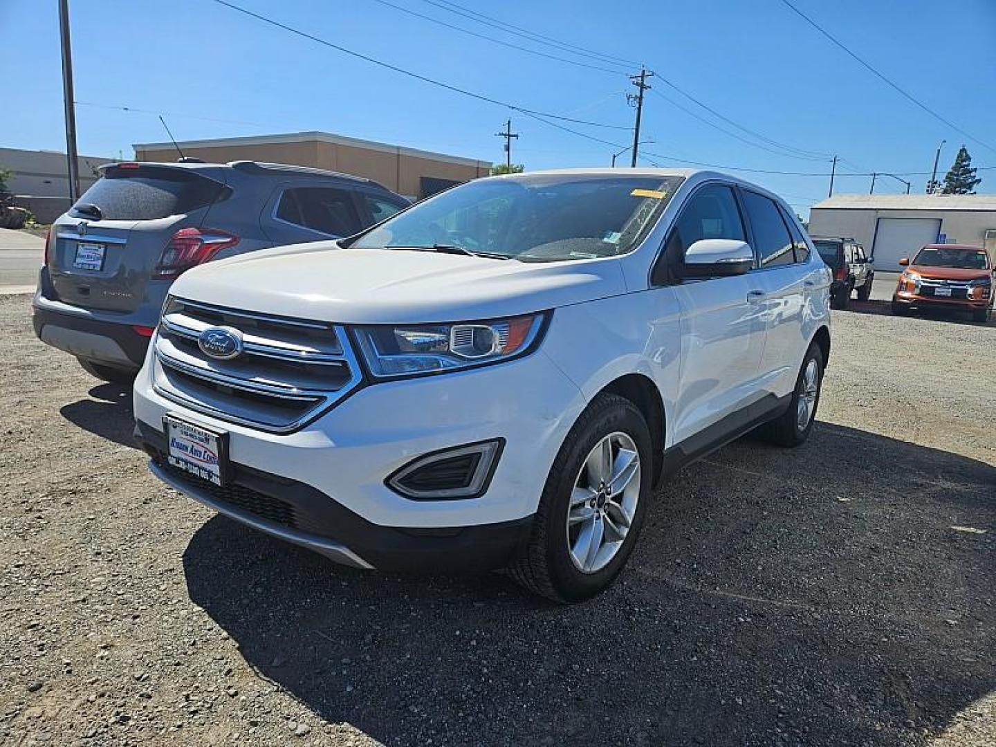 2016 white /Black Ford Edge (2FMPK3J88GB) with an V6 3.5 Liter engine, Auto 6-Spd SelShft transmission, located at 246 E Walker St., Orland, 95963, (530) 865-5800, 39.747589, -122.178398 - Photo#0