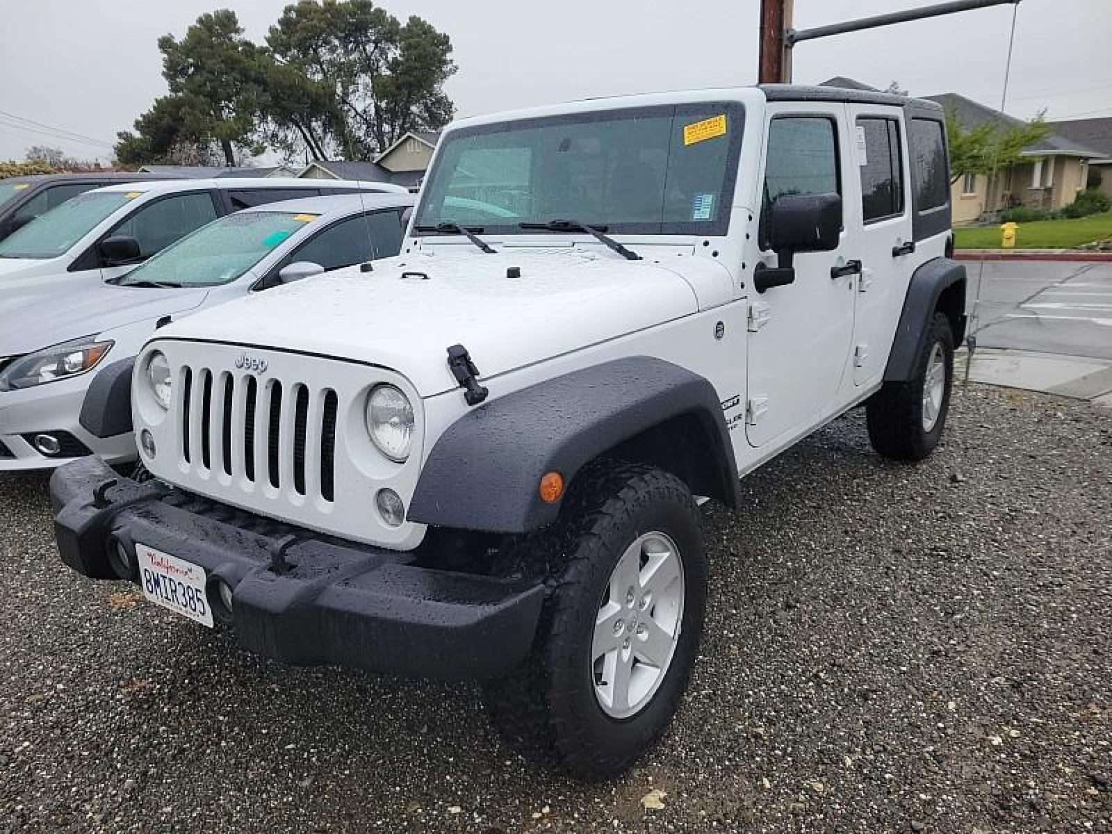 2017 WHITE Jeep Wrangler Unlimited (1C4HJWDG5HL) with an V6 3.6 Liter engine, Automatic 5-Spd transmission, located at 246 E Walker St., Orland, 95963, (530) 865-5800, 39.747589, -122.178398 - Photo #0