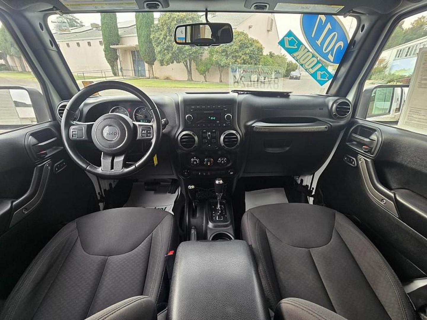 2017 WHITE Jeep Wrangler Unlimited (1C4HJWDG5HL) with an V6 3.6 Liter engine, Automatic 5-Spd transmission, located at 246 E Walker St., Orland, 95963, (530) 865-5800, 39.747589, -122.178398 - Photo#18